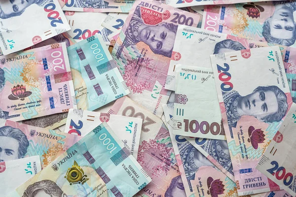 a large amount of bribes in Ukrainian currency is on the table after their withdrawal. The concept of corruption