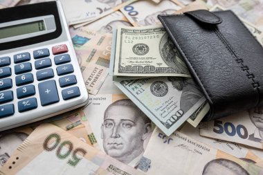 Para arkaplan hesap makinesi dolar ve Hryvnia. Değişim konsepti