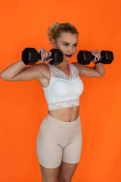 Beautiful Young Female Trainer Sports Top Holds Pink Dumbbells Her — Stockfoto