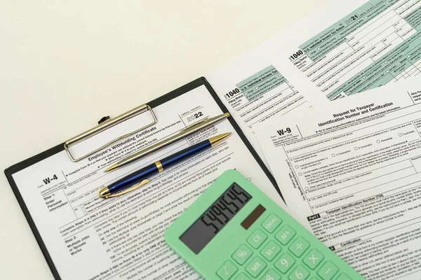 Top View Tax Forms Tablet Office Desk Calculator Pen Concept — Fotografia de Stock