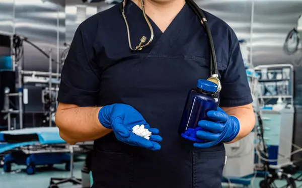 Male Doctor Holding Pack Different Tablet Pills Hospital Room Disease — Stockfoto