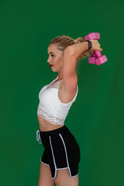 Sporty Young Woman Working Out Dumbbells Isolated Plain Background Sporty — Stockfoto