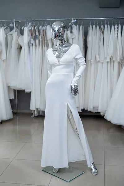 Beautiful wedding bridal dresses on mannequin in showroom in mall