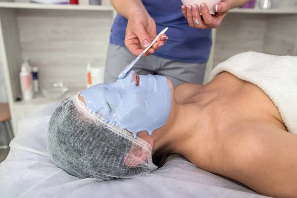 Beautician Procedures Dermatolog Applying Face Mask Young Woman Wellness — Stock fotografie