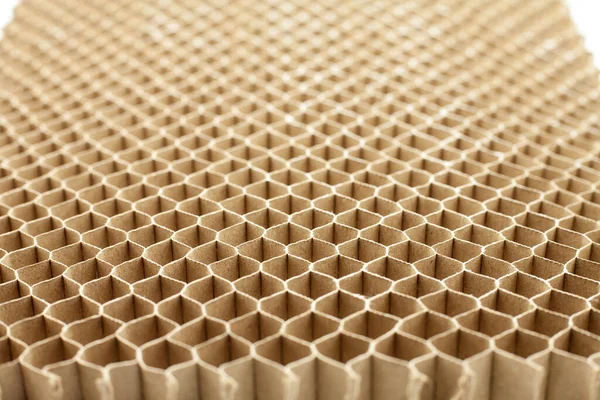 Bal peteği şeklinde karton bölme. Yakın plan. Karton bölmenin güzel deseni.