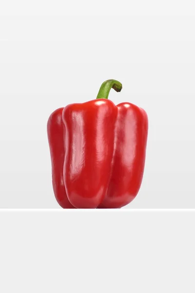 fresh red bell pepper, mexican ingredient on minimalistic white background, no people