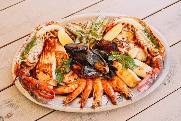 A delicious seafood barbecue with mussels, prawns and lobster