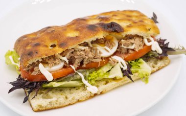 Ciabatta bread sandwich with pulled pork and vegetables