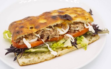 Ciabatta bread sandwich with pulled pork and vegetables