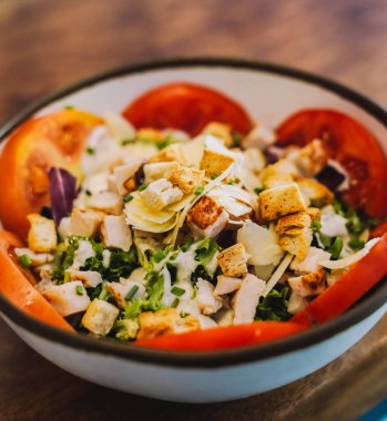 Plate of a gourmet chicken caesar salad