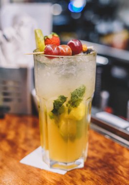 An extra-large sized Mojito made with rum, mint, sugar and lime 