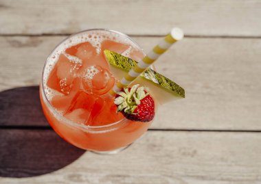 A sex on the beach cocktail made with vodka, orange juice and peach schnapps