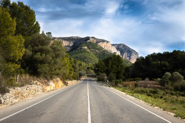 Grey concrete mountain road, highway in mountains, Montgo, travel to Denia, Spain