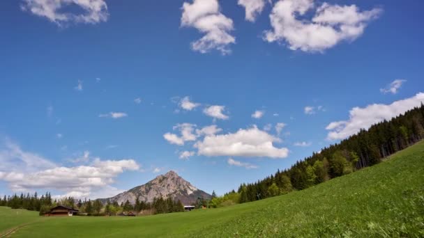 Mountain green meadow. Mountain cottage in Mala Fatra. Rocky mountain in summer, blue sky with small clouds — Stock video