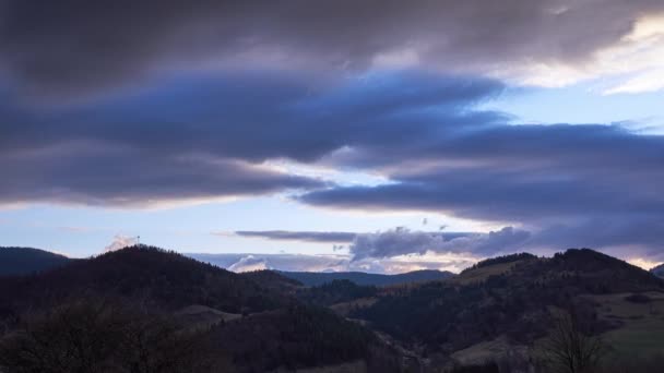 Hilly mountainous Carpathian forest landscape, Dense clouds, heavy storm clouds, fast moving clouds. — ストック動画