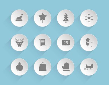christmas vector icons on round puffy paper circles with transparent shadows on blue background. Stock vector icons for web, mobile and user interface design