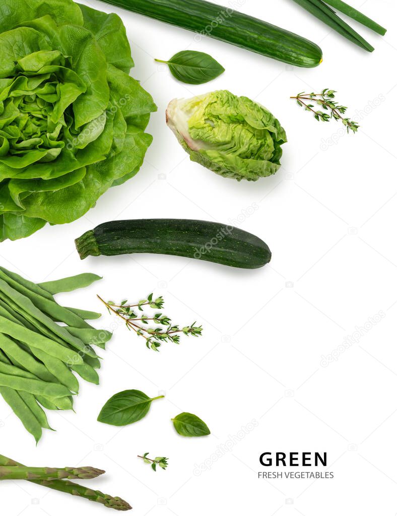 Variety of green vegetables isolated on white background. Bio vegetables.
