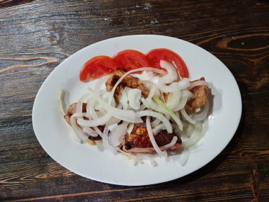 Sebzeli domuz kebabı.