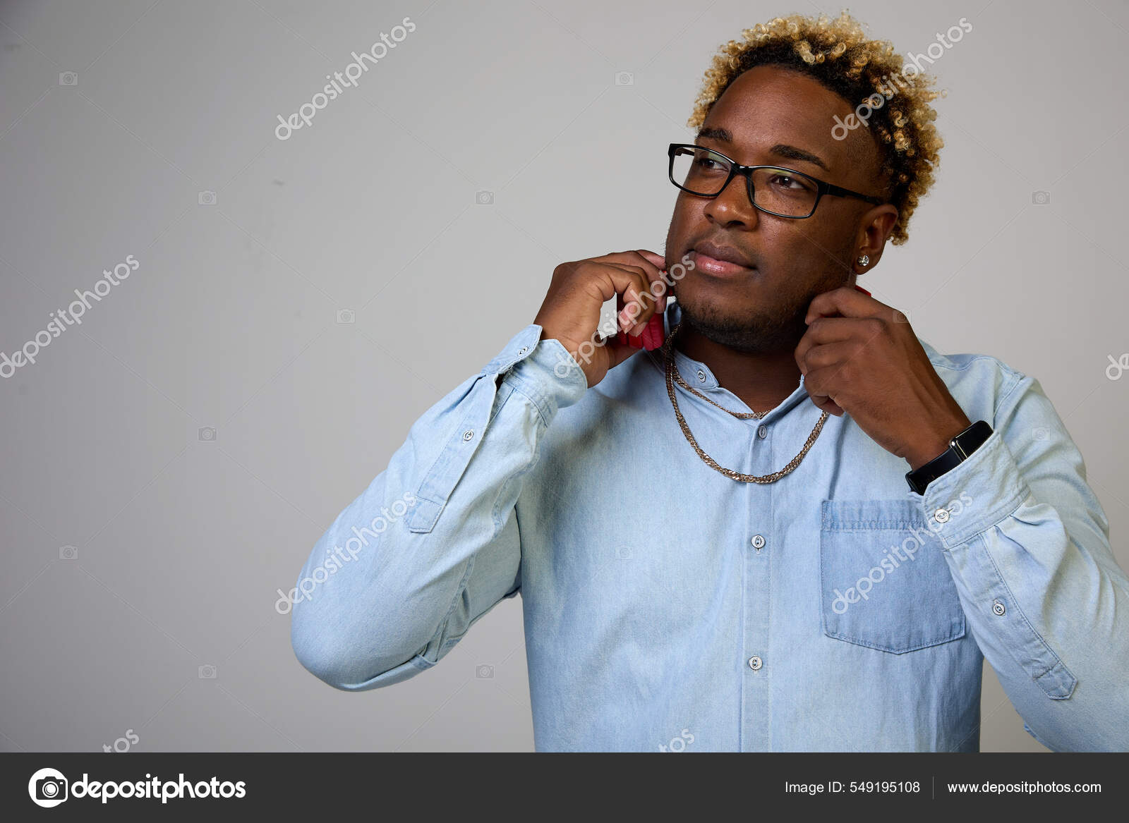 A man with glasses and a red and black shirt photo – Man Image on