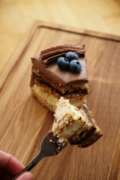Piece Kiev Cake Chocolate Icing Blueberries Bite Cake Fork — Stock Photo, Image