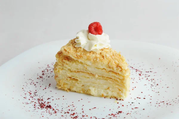 Slice Classic Napoleon Cake Decorated Cream Fresh Raspberries White Plate — стоковое фото