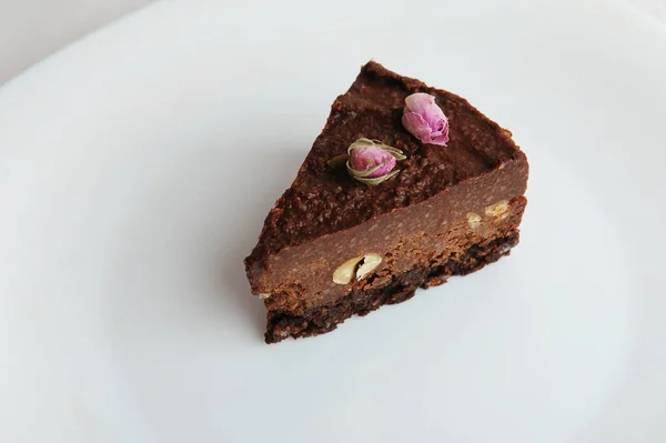 Slice Vegan Chocolate Nut Cake White Blackground Close — Fotografia de Stock