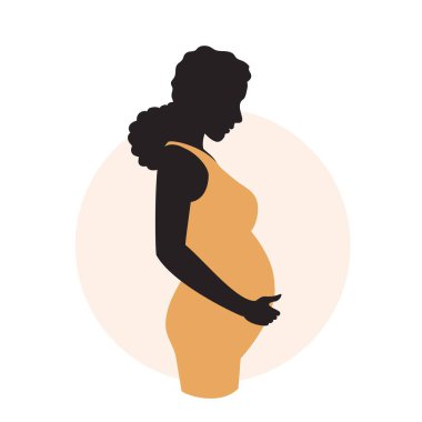 Genç hamile bir kadının silueti. 