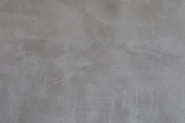 Lekeli gri betondan oluşan soyut arka plan duvarı, kopya alanı ve çatı katı tasarım konseptiyle ilgili tamir ve bitirme işleri için yapı malzemelerinin dokusu. Yüksek kalite fotoğraf
