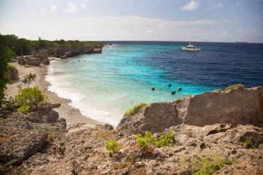 group of tourist snorkeling at open sea 
