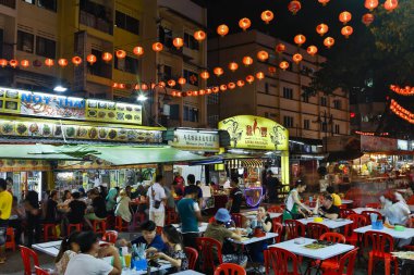 Kuala Lumpur; Malaysia - December 1, 2015: Street scene of Jalan Alor a popular food and eatinig area at night located in Bukit Bintang area of Kuala Lumpur; Malaysia.