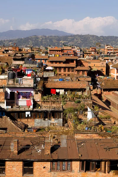 Urban density in the city of Bhaktapur, Nepal. Bhaktapur, known locally as Khwopa, is a city in the east corner of the Kathmandu Valley in Nepal located about 13 kilometres from the capital city, Kathmandu.