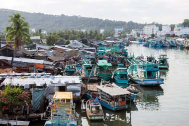 Phu Quoc, Vietnam - January 25, 2018: Vietnamese fishing boats on the Duong Dong River located in the city of Duong Dong on Phu Quoc Island, Vietnam.