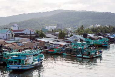 Phu Quoc, Vietnam - January 25, 2018: Vietnamese fishing boats on the Duong Dong River located in the city of Duong Dong on Phu Quoc Island, Vietnam.