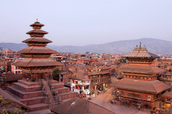 Bhaktapur, Nepal - October 28, 2012: Nyatapola Temple is a pagoda located in the city of Bhaktapur, Nepal. The temple is a UNESCO World Heritage site. Bhairavnath Temple is a Hindu temple located to the right of Nyatapola Temple.