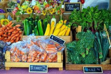 An arrangement of organic vegetables on display at a farmer's market in Penticton, British Columbia, Canada.