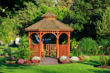 Cedar wooden gazebo at the rose garden in the city park of Penticton, British Columbia, Canada located in the Okanagan Valley.