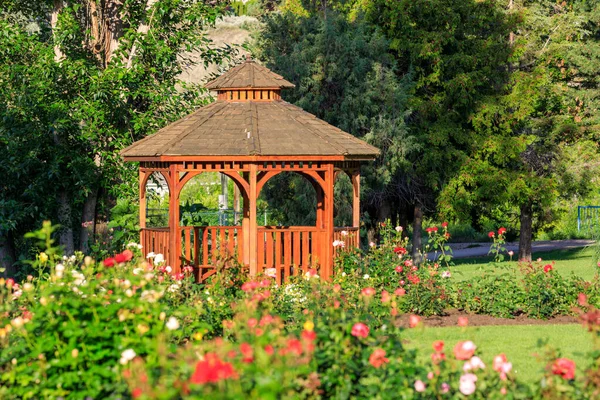 Cedar wooden gazebo at the rose garden in the city park of Penticton, British Columbia, Canada located in the Okanagan Valley.