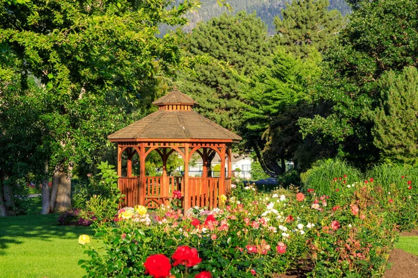 Cedar wooden gazebo at the rose garden in the city park of Penticton, British Columbia, Canada located in the Okanagan Valley.