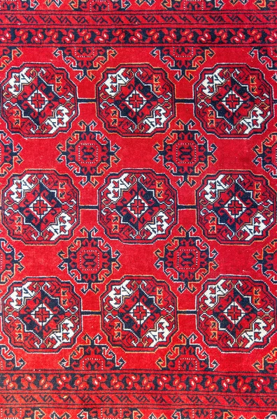 Textura de alta calidad de una alfombra persa real, rojo. —  Fotos de Stock