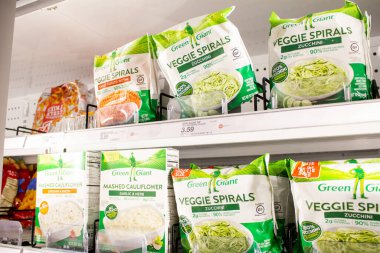 Los Angeles, California, United States - 03-18-2021: A view of several packages of Green Giant frozen vegetables, in the freezer section of a local grocery store.