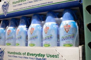 Los Angeles, California, United States - 04-06-2021: A view of several containers of Dust-Off Compressed gas Duster, on display at a local big box grocery store.