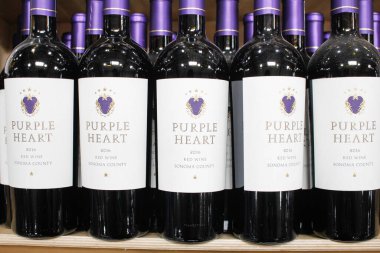 Los Angeles, California, United States - 04-06-2021: A view of several bottles of 2016 Purple Heart blended red wine, on display at a local grocery store.