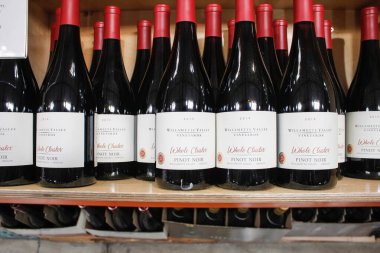 Los Angeles, California, United States - 04-06-2021: A view of several bottles of 2019 Willamette Valley Vineyards Whole Cluster pinot noir wine, on display at a local grocery store.