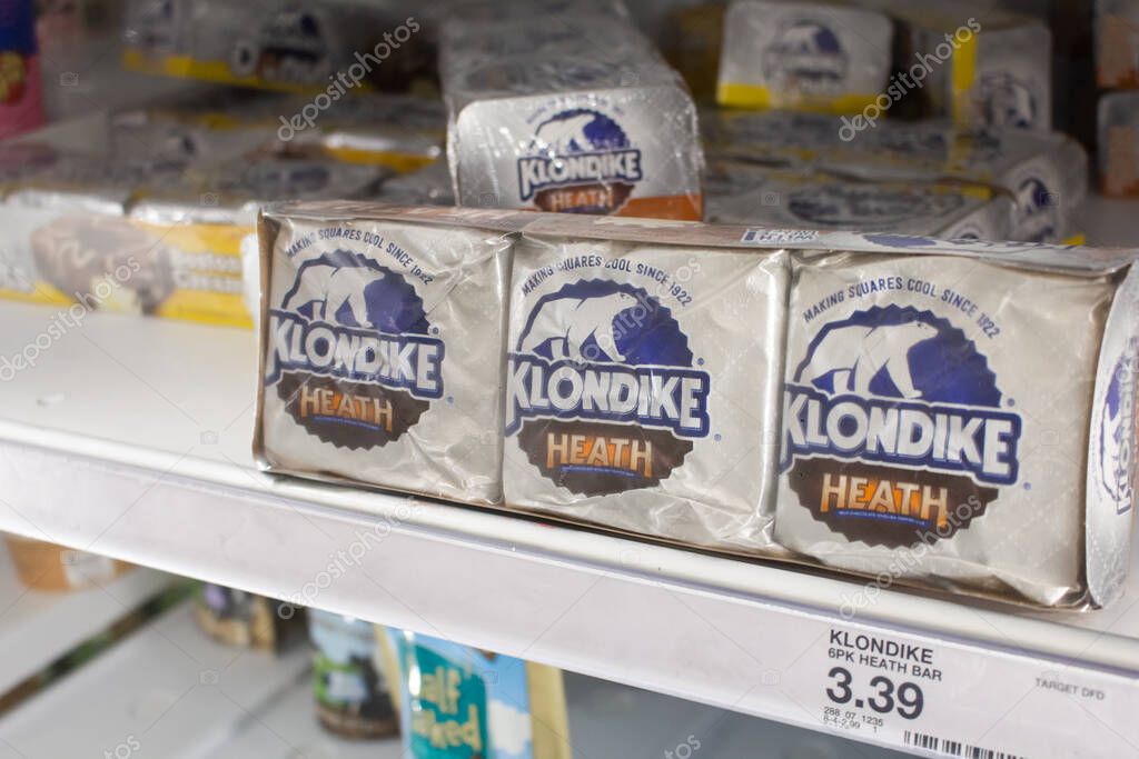 Los Angeles, California, United States - 03-18-2021: A view of several packages of Klondike Heath ice cream sandwiches, on display at a local grocery store.