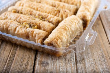 A view of a push sign on a retail front door.