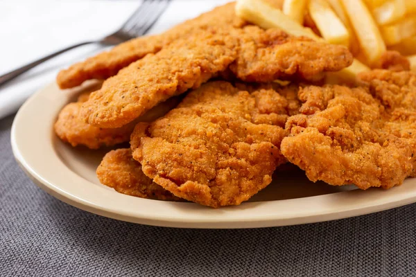 Closeup View Plate Chicken Tenders French Fries Restaurant Kitchen Setting — стоковое фото