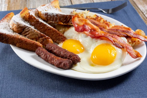 View French Toast Breakfast Plate Featuring Sunny Side Eggs Bacon — Stock Photo, Image