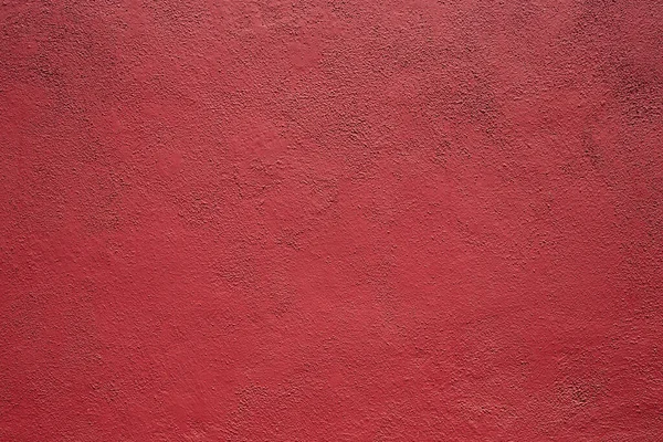 一个红色粉刷纹理墙的视图 作为背景 — 图库照片