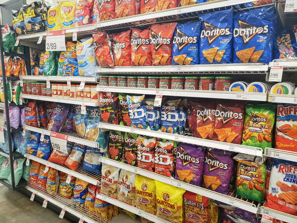 Los Angeles, California, United States - 04-26-2021: A view of the chip snack aisle, on display at a local grocery store.