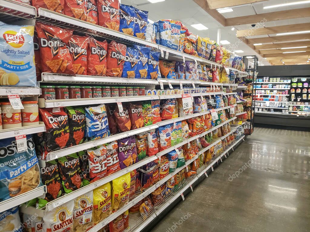 Los Angeles, California, United States - 04-26-2021: A view of the chip snack aisle, on display at a local grocery store.